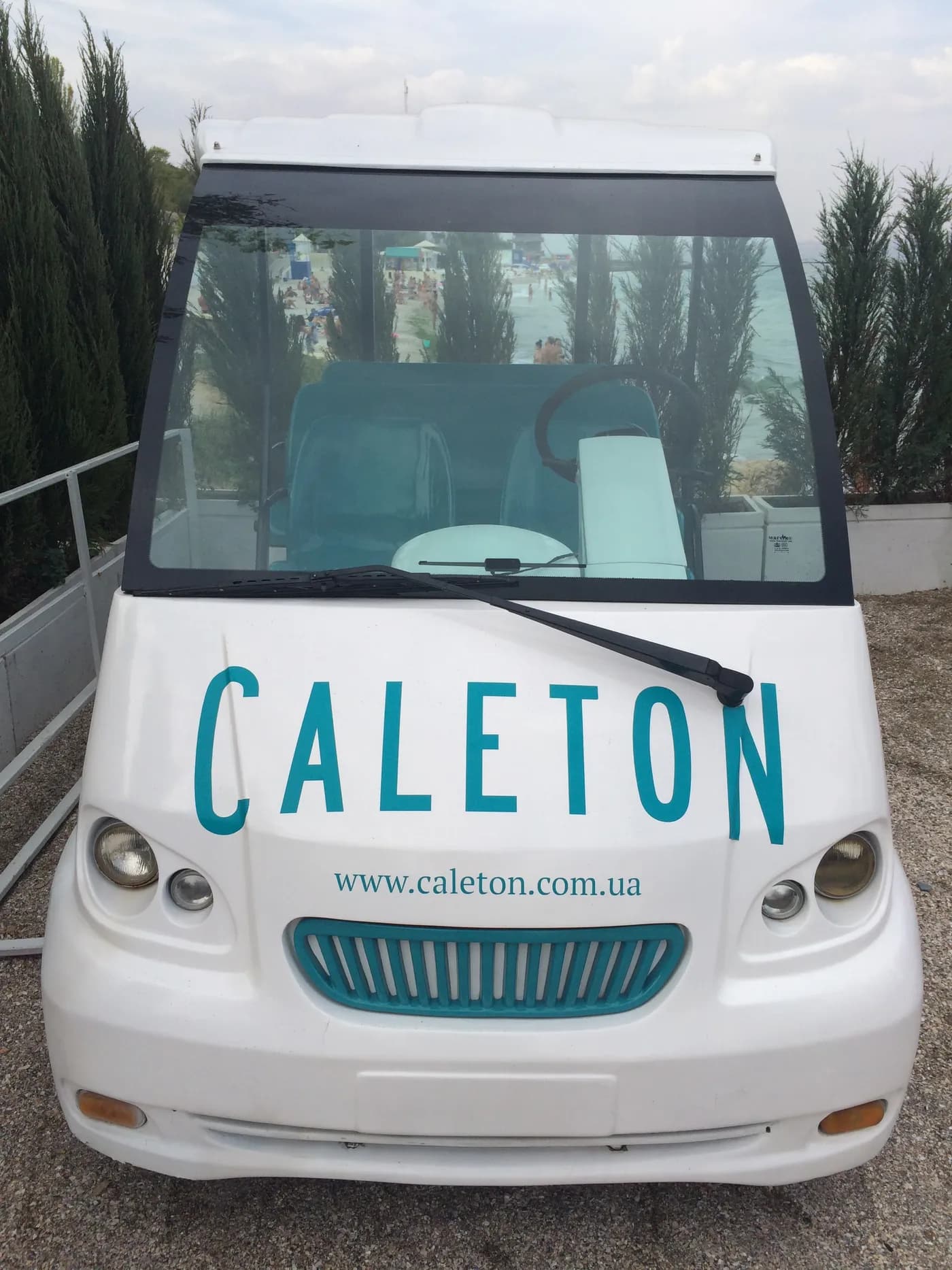 Branded beach-club shuttle car