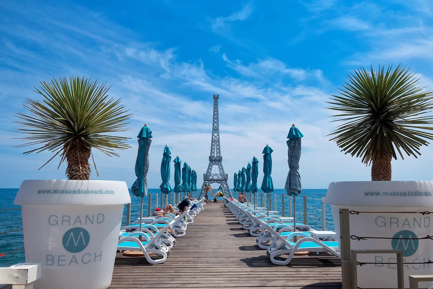 Beach club pier with sun loungers