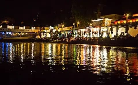 Waterfront venues lit at night